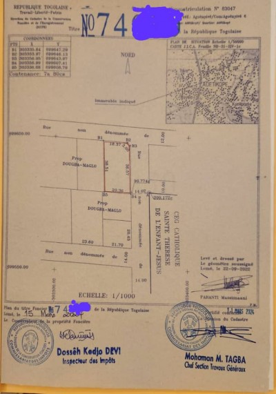 1 lot 1/4 cloturé avec titre foncier à 400m du goudron
